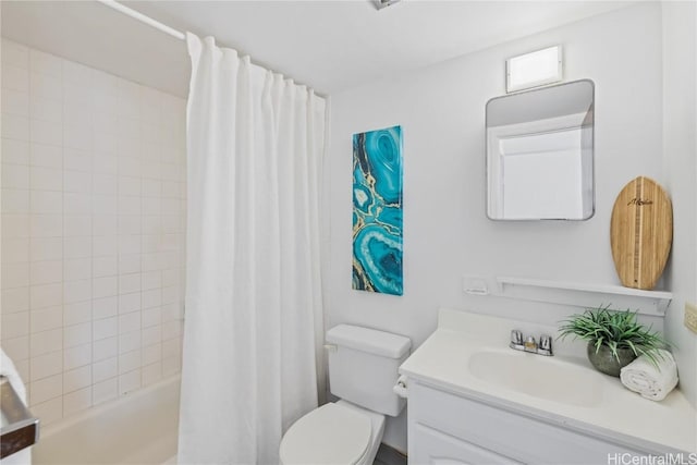 full bathroom featuring shower / bath combination with curtain, vanity, and toilet