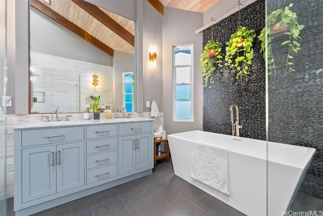 bathroom featuring vanity, a tub to relax in, lofted ceiling with beams, and wooden ceiling