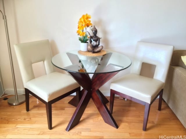 dining area with light hardwood / wood-style flooring