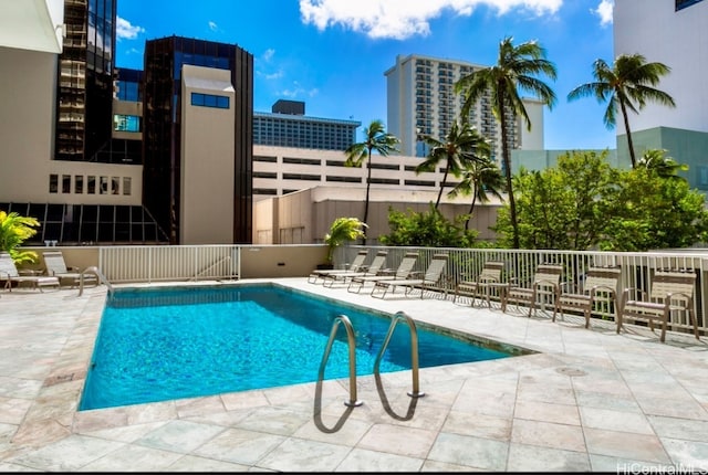 view of pool featuring a patio