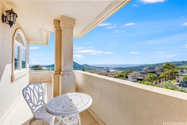 balcony featuring a mountain view