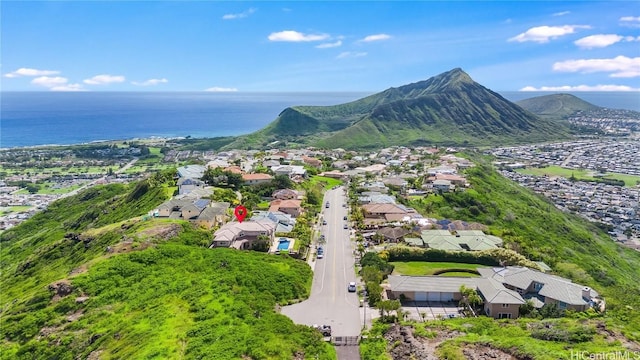 aerial view featuring a water and mountain view