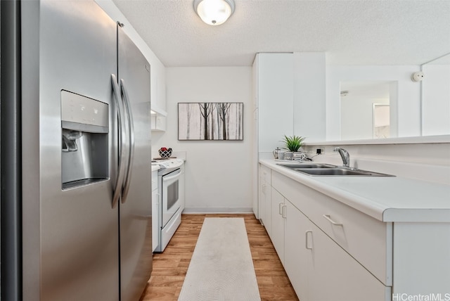 kitchen with sink, white electric range, white cabinetry, stainless steel fridge with ice dispenser, and light wood-type flooring