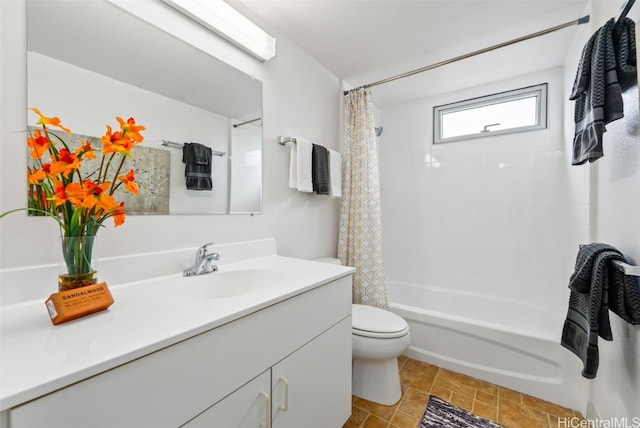 full bathroom with vanity, tile patterned floors, toilet, and shower / bathtub combination with curtain