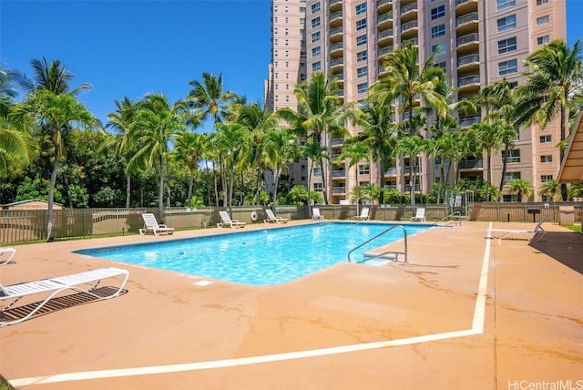 view of pool featuring a patio area