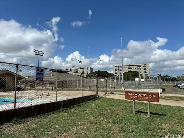 view of home's community featuring a lawn