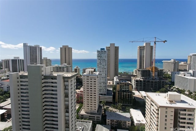 property's view of city with a water view