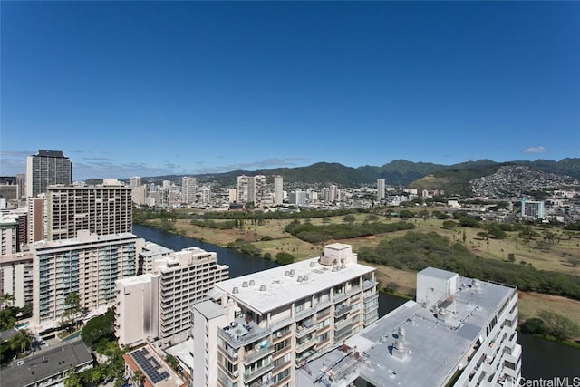 birds eye view of property featuring a water and mountain view