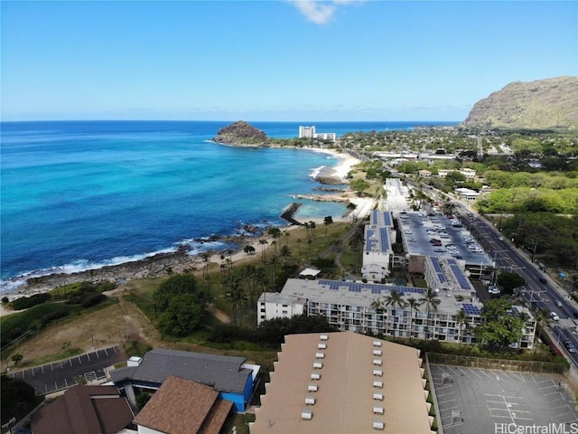 birds eye view of property featuring a water view and a view of the beach