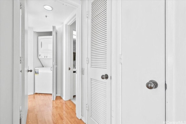 1212 Nuuanu Ave Unit 705, Honolulu, HI 96817 - hall featuring stacked washer / drying machine and light wood-type flooring