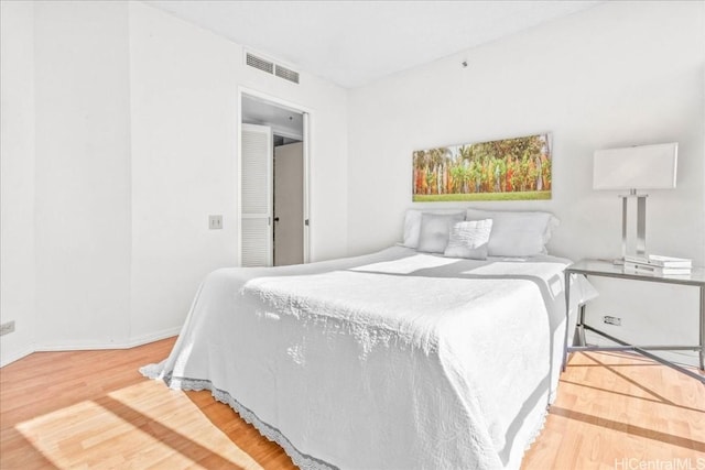 bedroom featuring hardwood / wood-style flooring