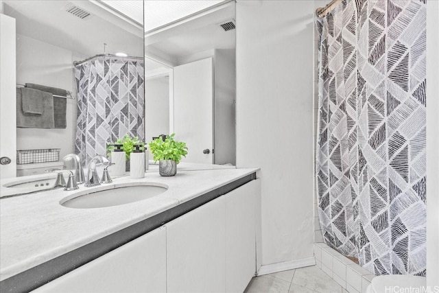 1212 Nuuanu Ave Unit 705, Honolulu, HI 96817 - full bathroom featuring vanity, curtained shower, and tile patterned floors