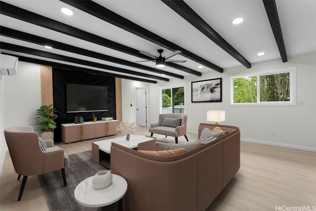 living room with ceiling fan, a wall mounted air conditioner, beam ceiling, and light hardwood / wood-style flooring