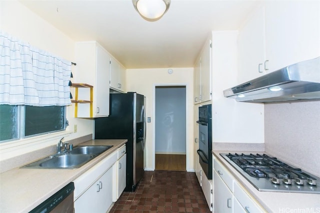 kitchen featuring white cabinetry, stainless steel appliances, and sink