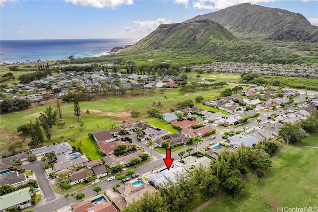 bird's eye view with a water and mountain view