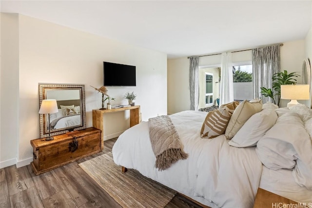 bedroom with wood-type flooring