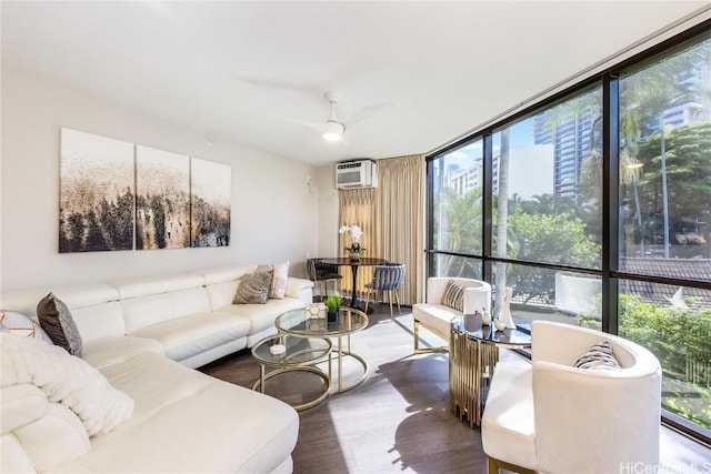 living room featuring dark wood-type flooring, ceiling fan, floor to ceiling windows, and a wall mounted AC