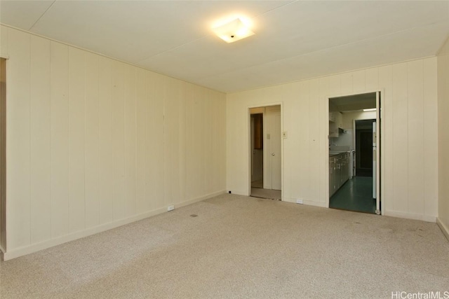 empty room featuring carpet floors