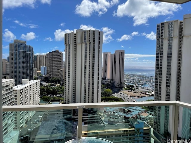 property's view of city with a water view