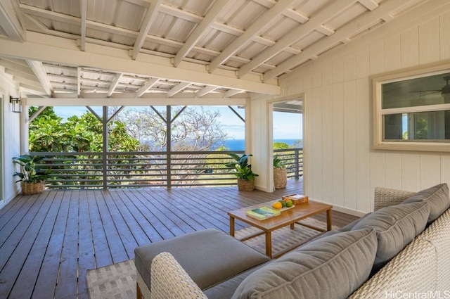 wooden terrace featuring outdoor lounge area