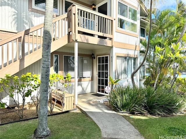 property entrance with a balcony