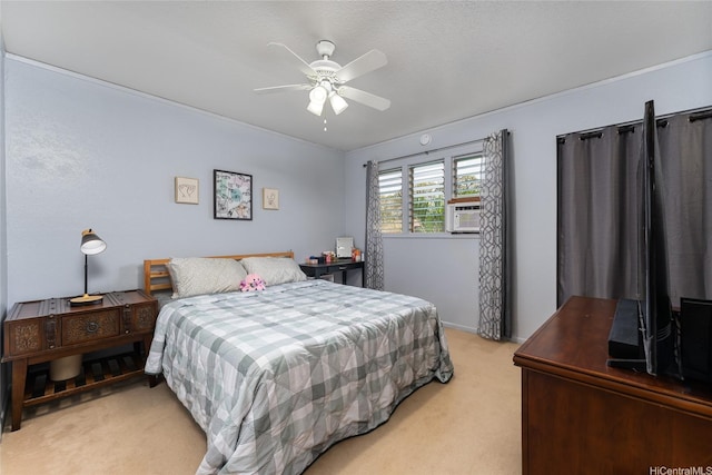 bedroom with light colored carpet and ceiling fan