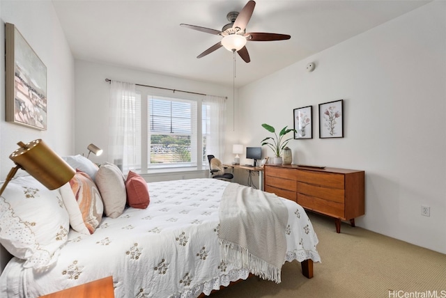 bedroom with ceiling fan and carpet flooring