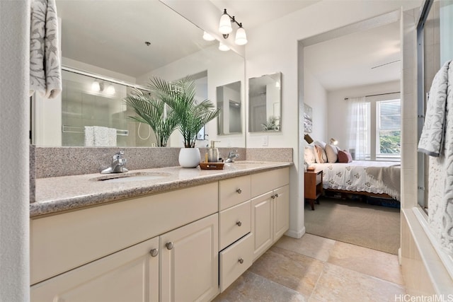 bathroom with vanity and an enclosed shower