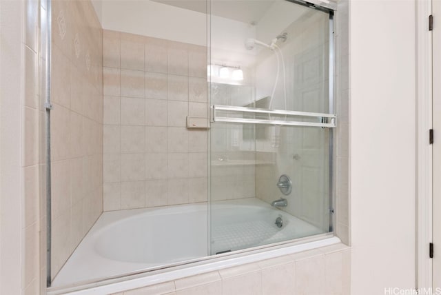 bathroom featuring enclosed tub / shower combo