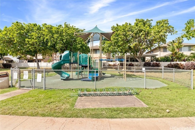 view of playground with a lawn