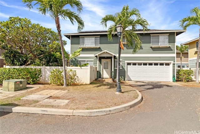 view of front of property with a garage