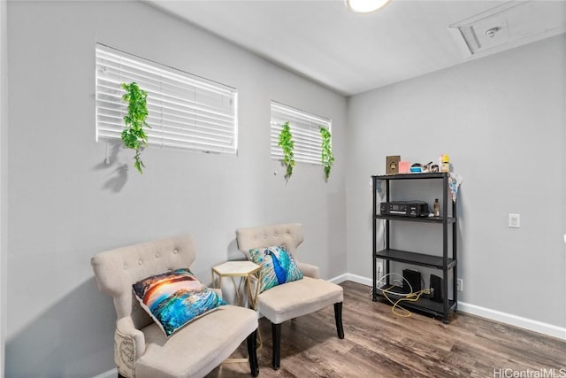 sitting room featuring hardwood / wood-style floors