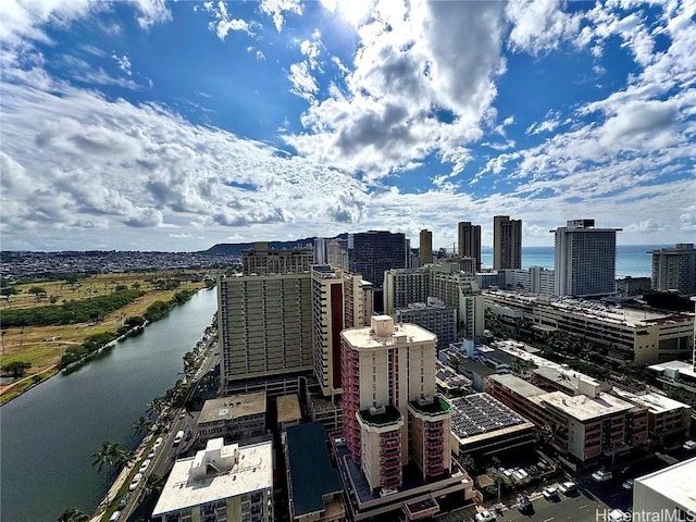 property's view of city with a water view