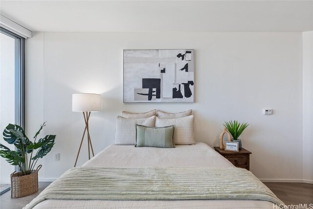 1000 Auahi St Unit 2505, Honolulu, HI 96814 - bedroom with baseboards and wood finished floors