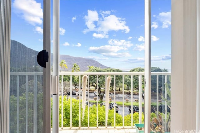 balcony featuring a mountain view