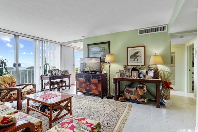 living room with a wall of windows