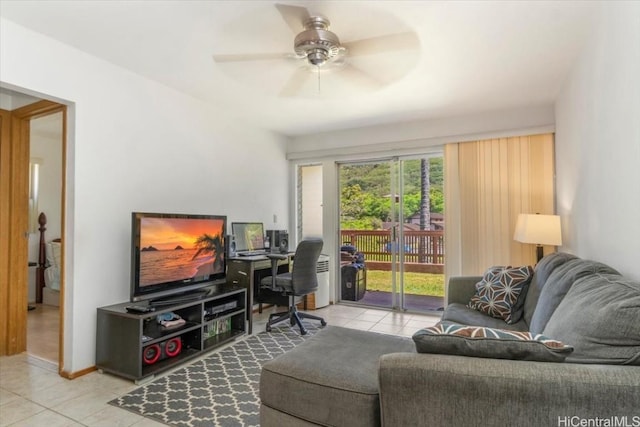 tiled living room with ceiling fan