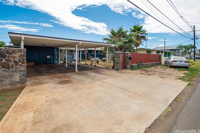 exterior space with a carport