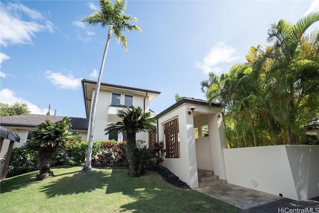 exterior space featuring a lawn