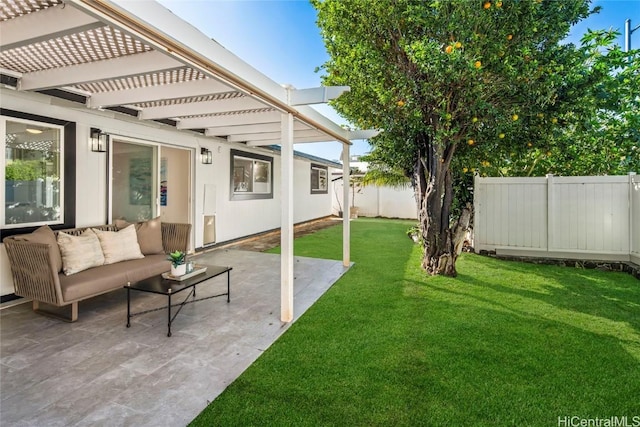 view of yard with an outdoor living space, a patio, and a pergola