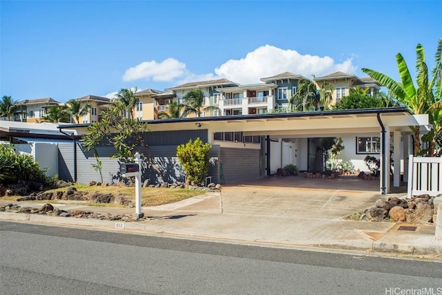 view of front of property with a carport