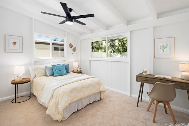 carpeted bedroom with vaulted ceiling with beams and ceiling fan