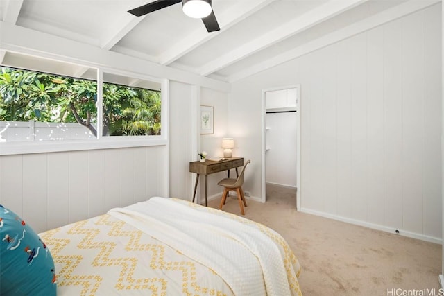 bedroom featuring vaulted ceiling with beams, ceiling fan, and carpet