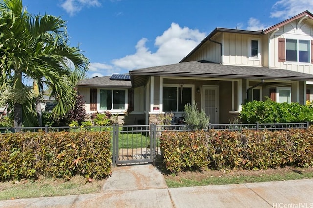 view of front of house with solar panels