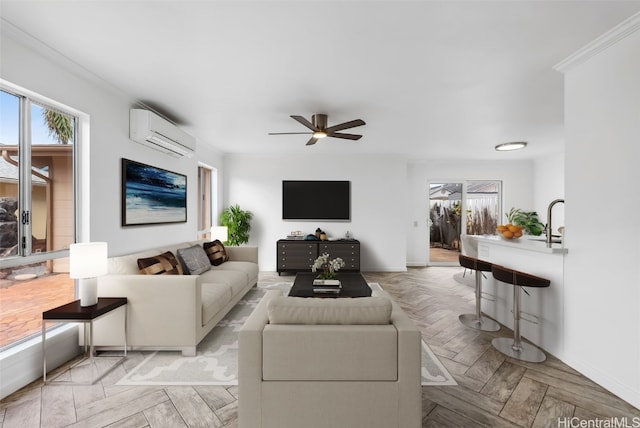 living room featuring sink, ornamental molding, a wall unit AC, ceiling fan, and light parquet flooring