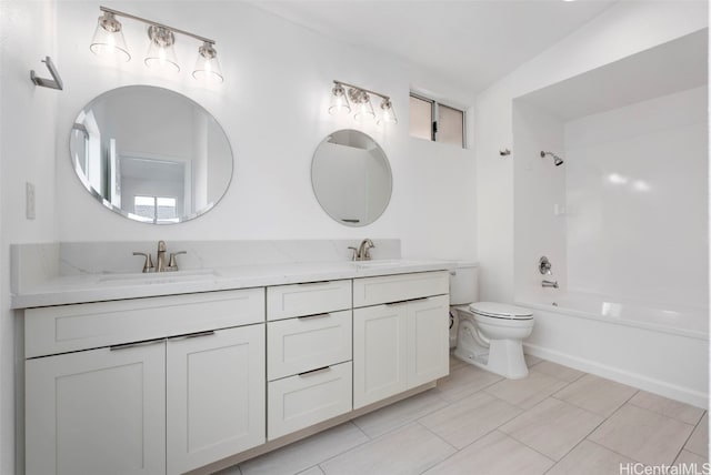 full bathroom featuring vanity, toilet, and shower / bath combination