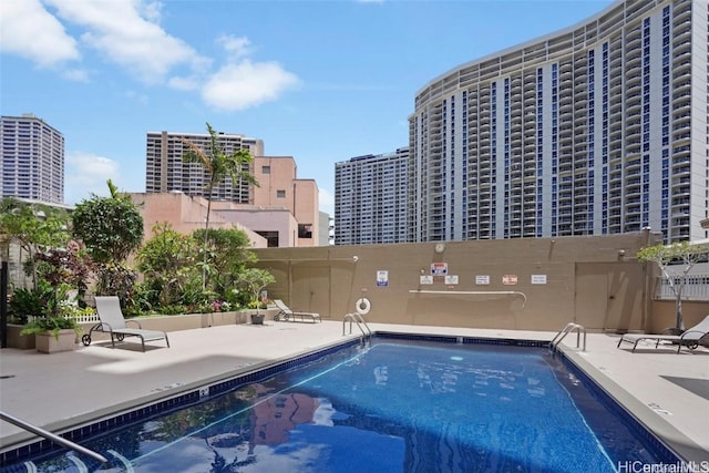 view of pool featuring a patio area