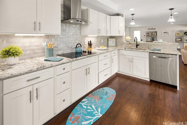 kitchen with wall chimney range hood, sink, dishwasher, white cabinetry, and black electric cooktop