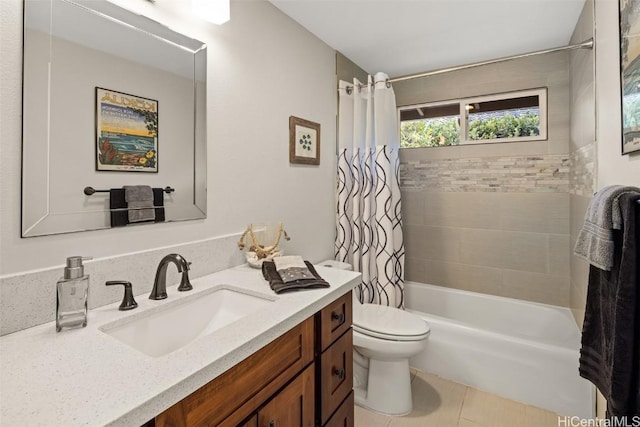 full bathroom featuring vanity, tile patterned floors, shower / bath combination with curtain, and toilet