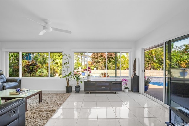 sunroom with ceiling fan and a wealth of natural light